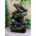 Zimmerbrunnen Gartenbrunnen Baumstamm mit LEDs Bild 1